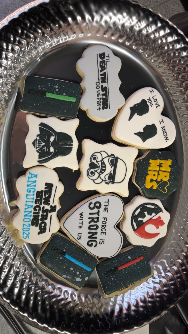 Star Wars themed wedding cookies on a silver platter